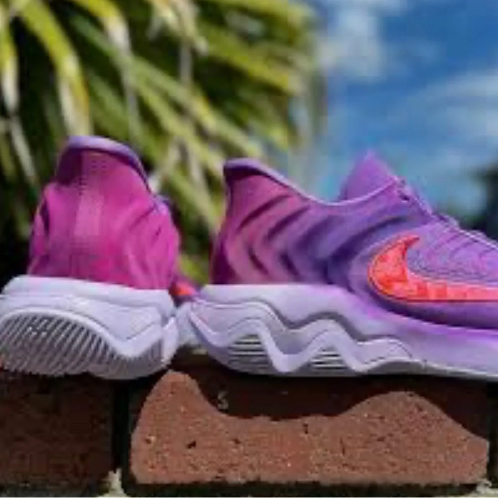 Nike women’s Purple & Pink Athletic Sneakers